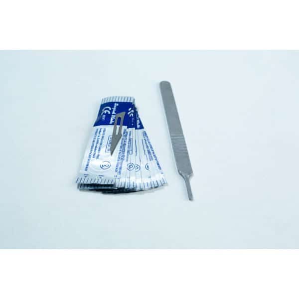 Scalpel and sterile blades inside packet